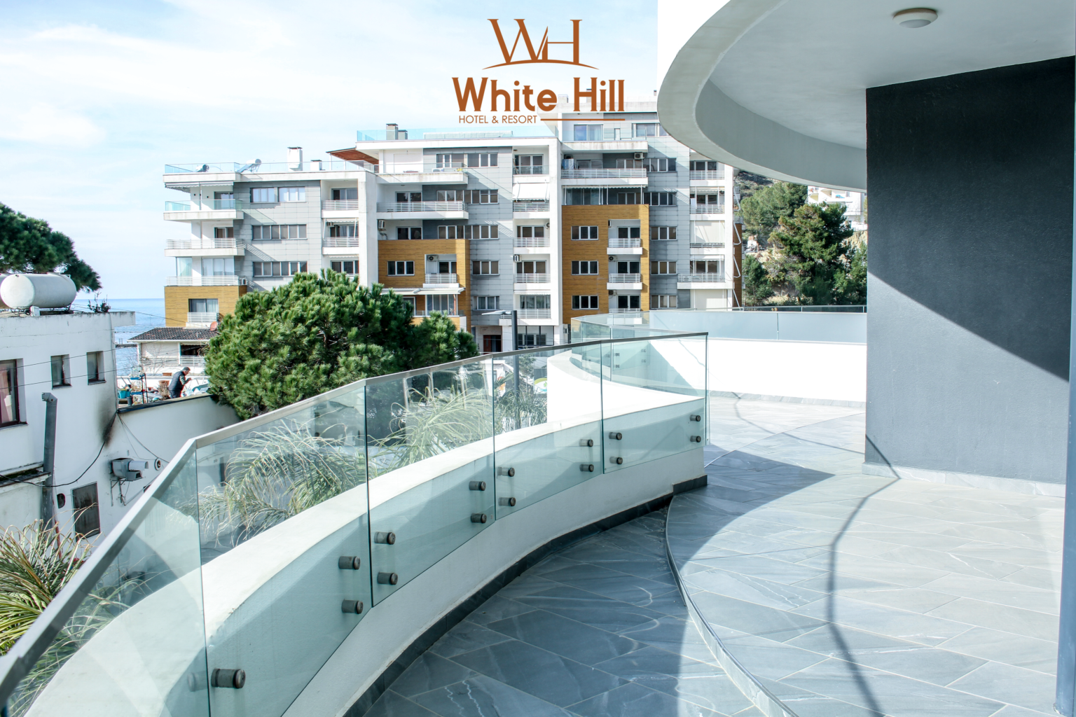 White Hill Resort is one of the most luxurious and amazing hotels on the coast of Durrës. This resort is located in a lively environment, where the beauty of nature and comfort meet in harmony for all visitors. The hotel rooms at White Hill Resort are designed to cater to a traveler's needs. Each room is fitted with modern elements, natural lighting and beautiful views of the sea or the wonderful greenery of nature. The hotel rooms are very spacious, including comfortable beds, large private bathrooms, air conditioning, mini-bar, excellent TV and unlimited Internet access. In addition, visitors can choose between rooms with sea views or those with beautiful views of the surrounding forests and gardens. In the restaurant house, which are scattered several restaurants, from those with a beautiful view of the sea to those specializing in local cuisine, and visitors can enjoy excellent cuisine and excellent service. In addition, White Hill Resort also offers additional services such as outdoor swimming pool, fitness center, beach sports, as well as spa and relaxation center for all their stress and relaxation activities. With a wonderful ambience, top services and amazing views, White Hill Resort in Durrës is a destination that is sure for your trip to the Adriatic coast. Fax: +355 52 504 100 Cell: +355 69 313 66 66 Address: Rruga e Currilove, 2001, Durres, Albania Email: info@whitehillhotel.al Web: www.whitehillhotel.al Instagram: Whitehill.hotel